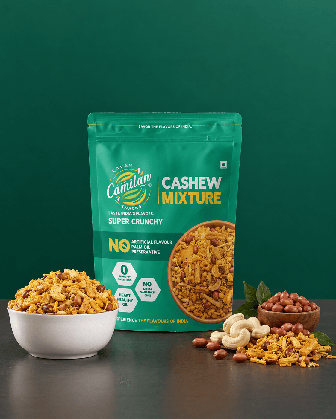 Lavan Cashew Mixture pouch with a white bowl of mixture and scattered cashews on a dark green background